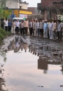 Tigri village residents protesting poor road conditions in Muzaffarnagar